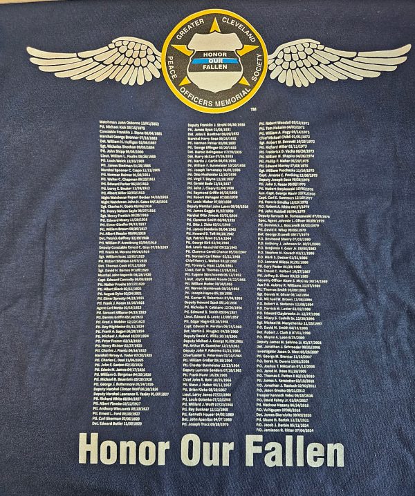 Back of the Honor Our Fallen memorial T-shirt featuring the GCPOMS roundel with wings and a full list of fallen officers' names and service dates.